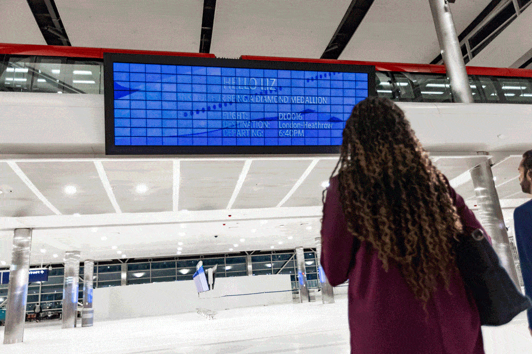 PARALLEL REALITY display at Delta's Detroit terminal
