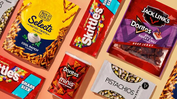 A flatlay of snacks available for purchase on board Delta flights