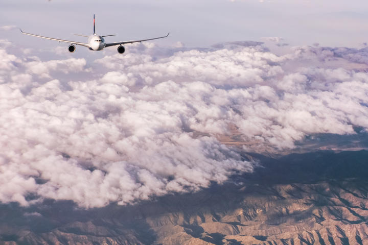 A330-300 flying through clouds